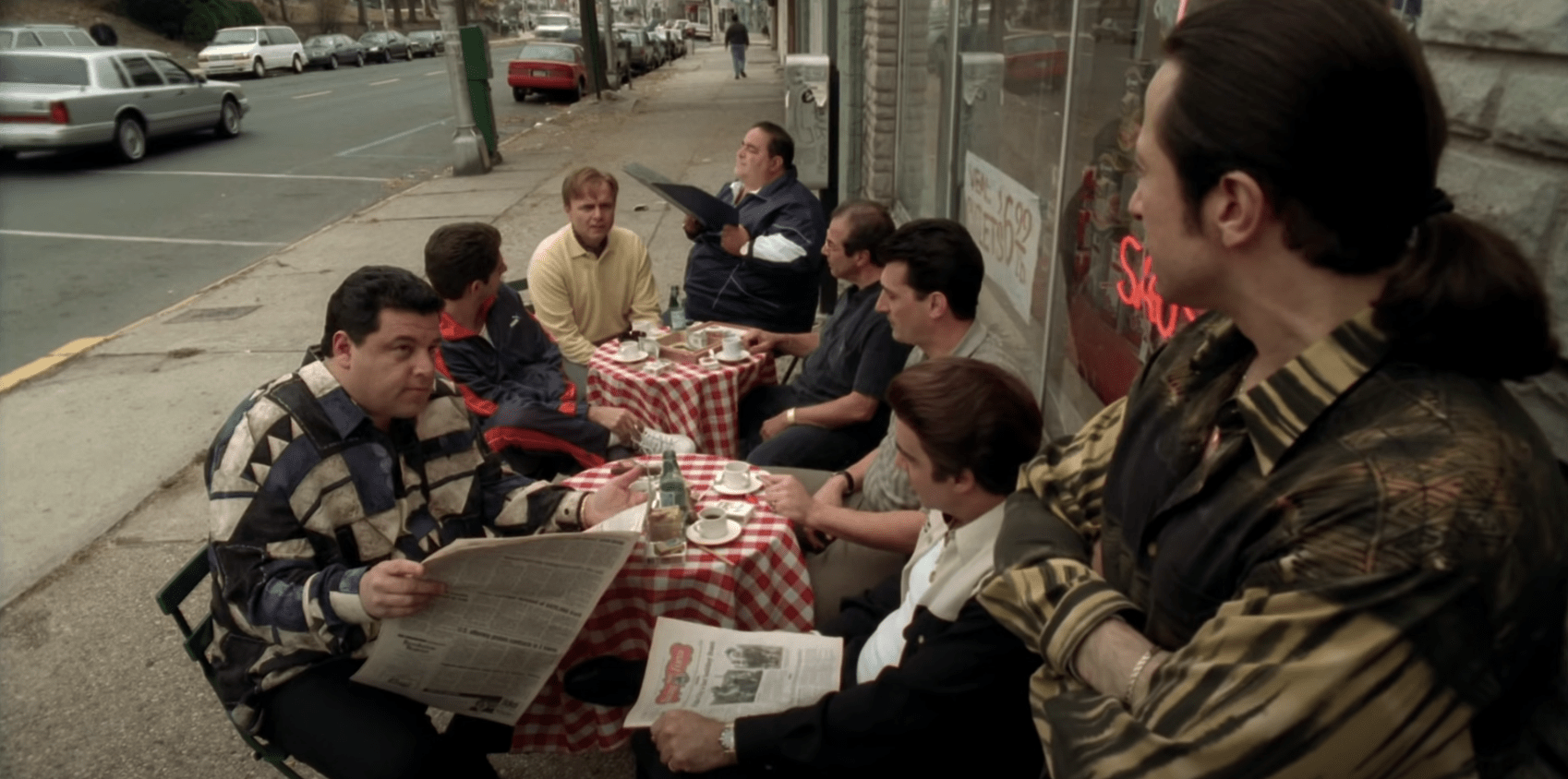 The Sopranos crew sitting outside the fictional Satriale's Pork Store in Paterson, New Jersey.