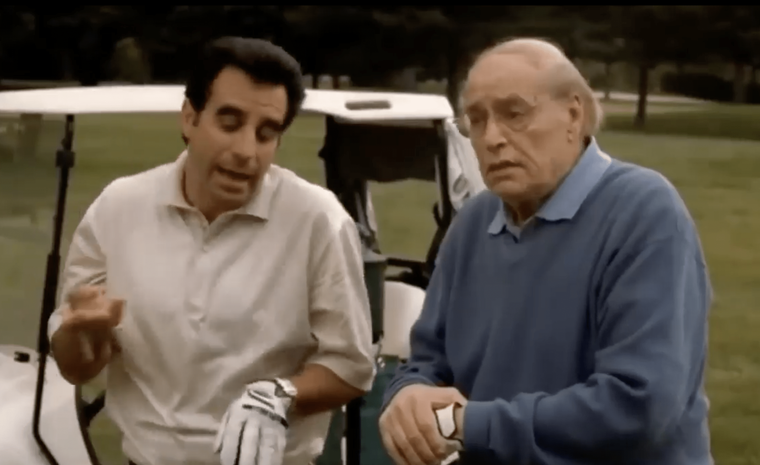 This is a photograph of the fictional Carmine Lupertazzi and his son, Little Carmine Lupertazzi, playing golf. This is the point in the series when Carmine, the boss, referred to The Sopranos as a "Glorified Crew."